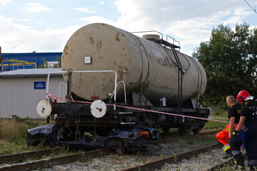 Car under train